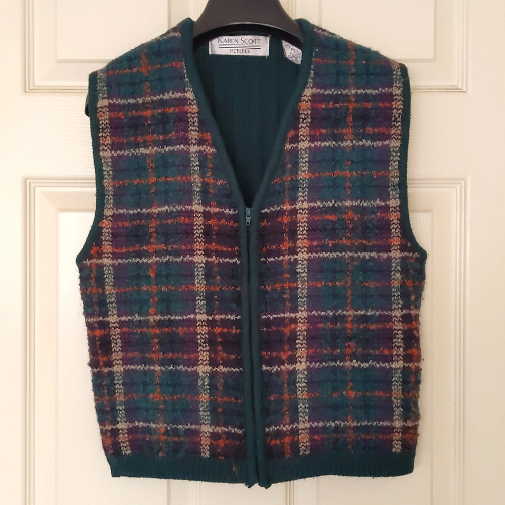 NWOT. Woman's Wool blended full zip sweater vest with plaid design.